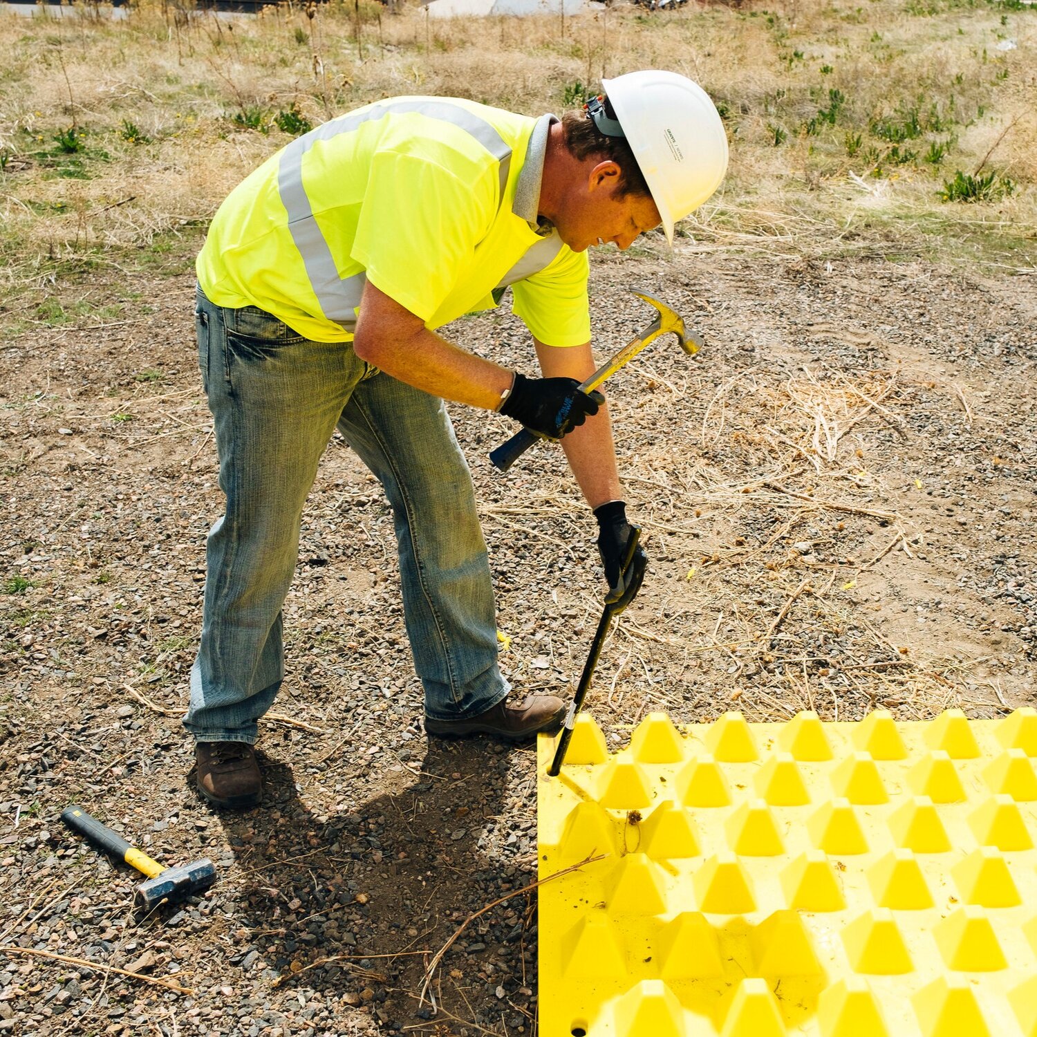 Person anchoring FODS tracking control mats in place