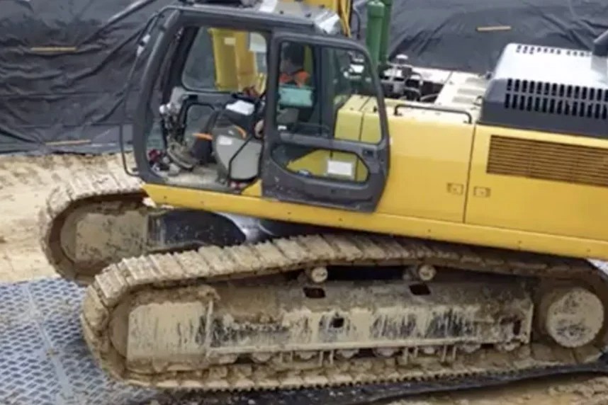 Construction Vehicle driving over DuraDeck mats