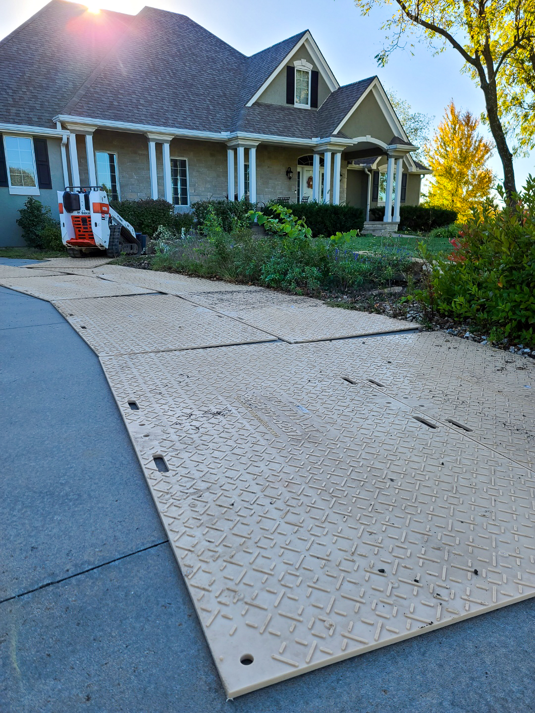 Scout Mats™ being used on a driveway